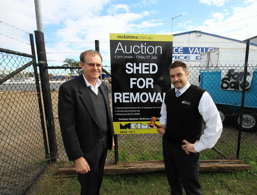 Tony Campbell tells auctioneer, Angus McKimm: ‘The shed must go’. Photo: Contributed